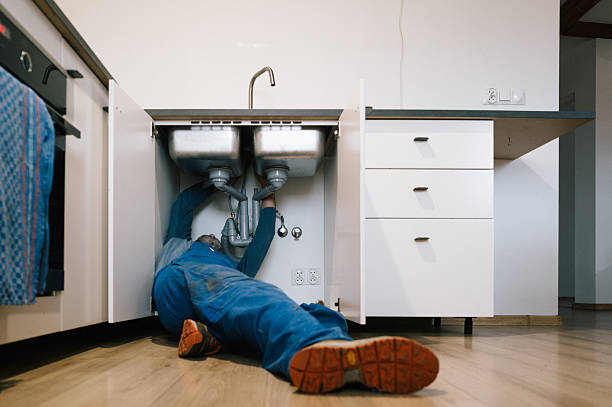 Professional Drain Cleaning technician working in Garfield, NJ